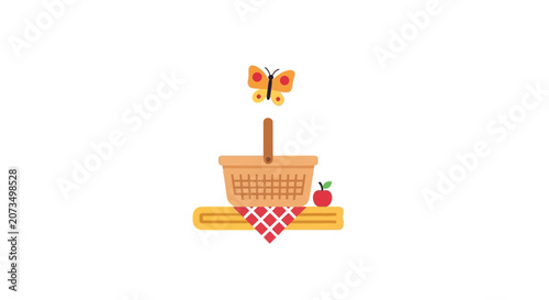 A small picnic basket sits on a red checkered cloth mat