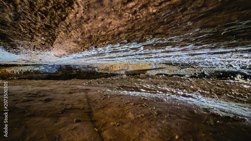 Bild auf Leinwand Low Ceiling Cave Chamber With Layered Rock