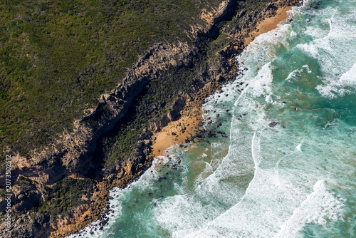 Princetown aerial view of coastal cliffs and rocky shoreline and sandy beach, Victoria Australia