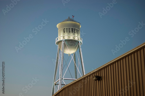 Water tower at night in city of Gilbert Arizona