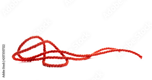 Photos Red string, rope isolated on white background, side view, design element