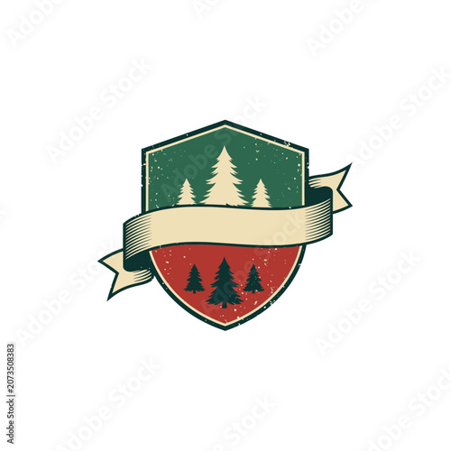 Vintage shield emblem with pine trees and ribbon.