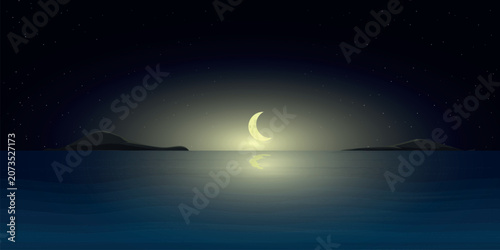 crescent moon reflected in the sea, night view.