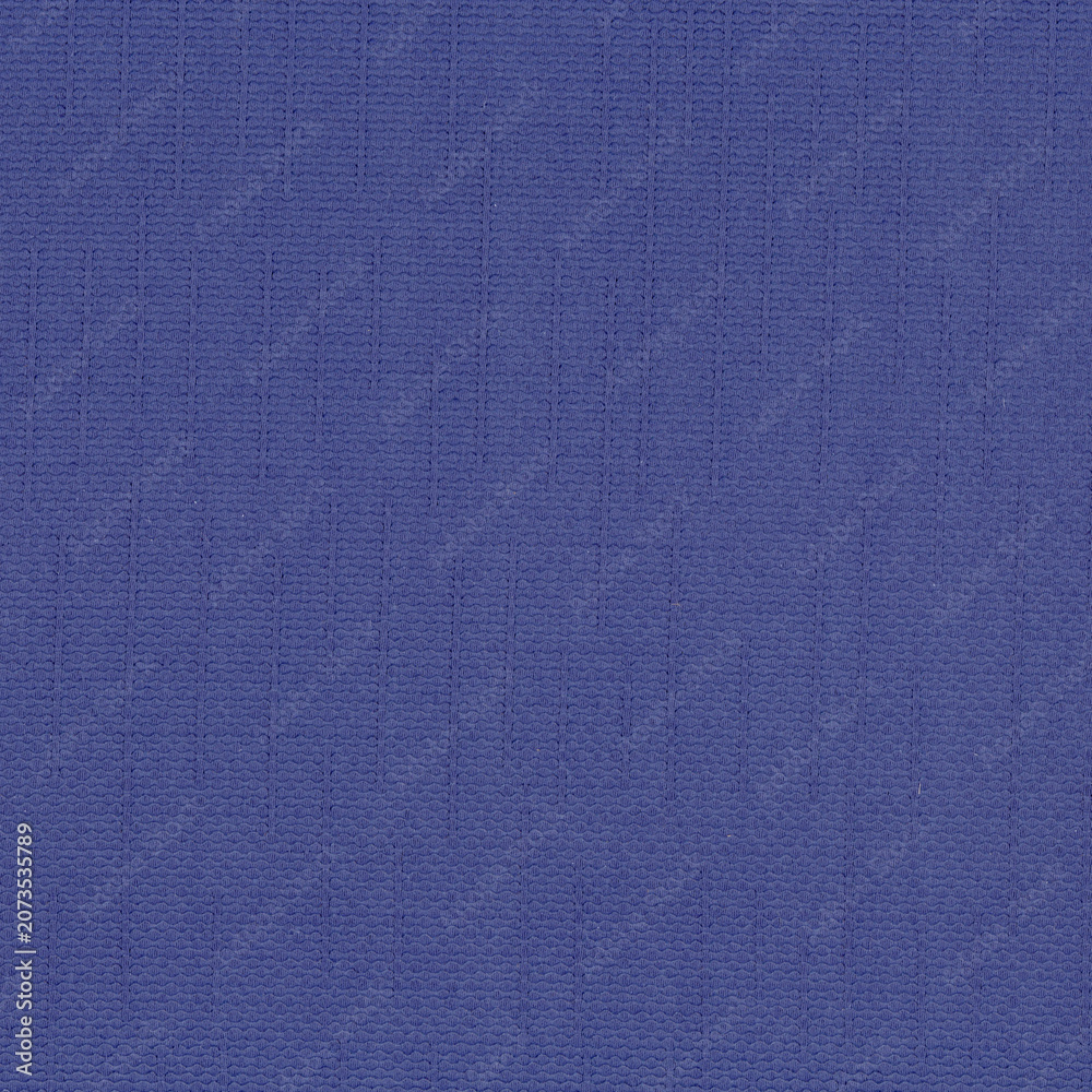 Fototapeta premium Textured blue fabric background with subtle grid pattern