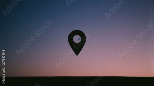 Minimalist Location Pin Icon Against a Gradient Sunset Sky, Representing Navigation and Discovery