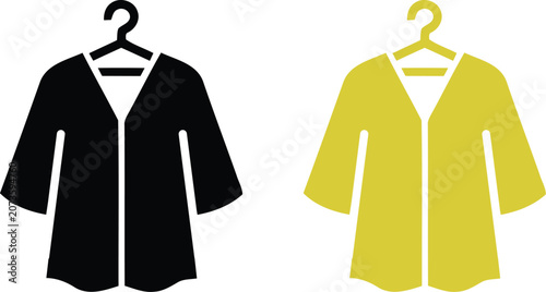 Quadro su tela Two colorful robes hanging and yellow hangers