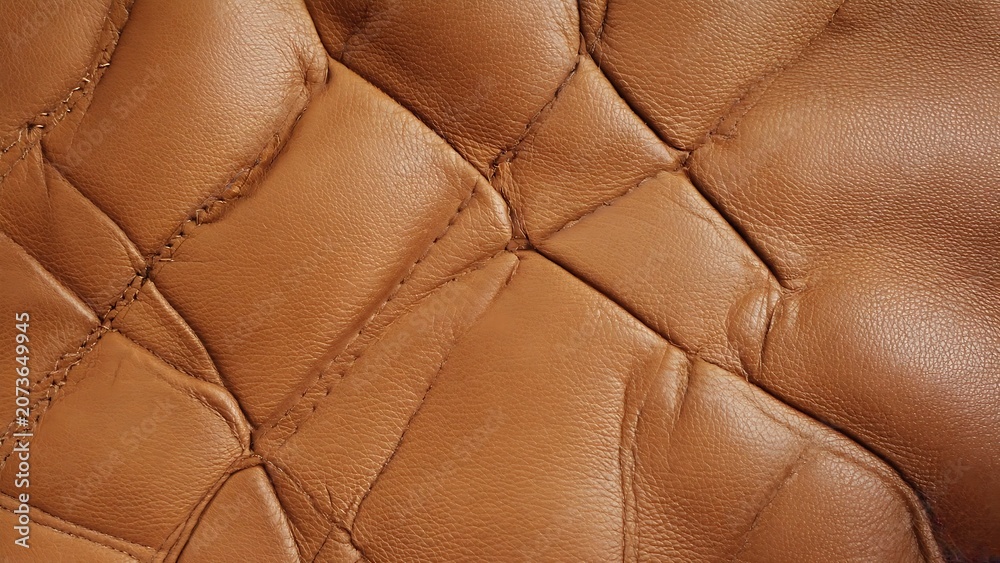 Naklejka premium Brown quilted leather texture