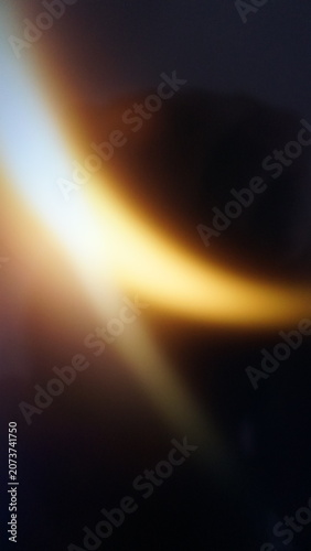Golden cinematic light streak background