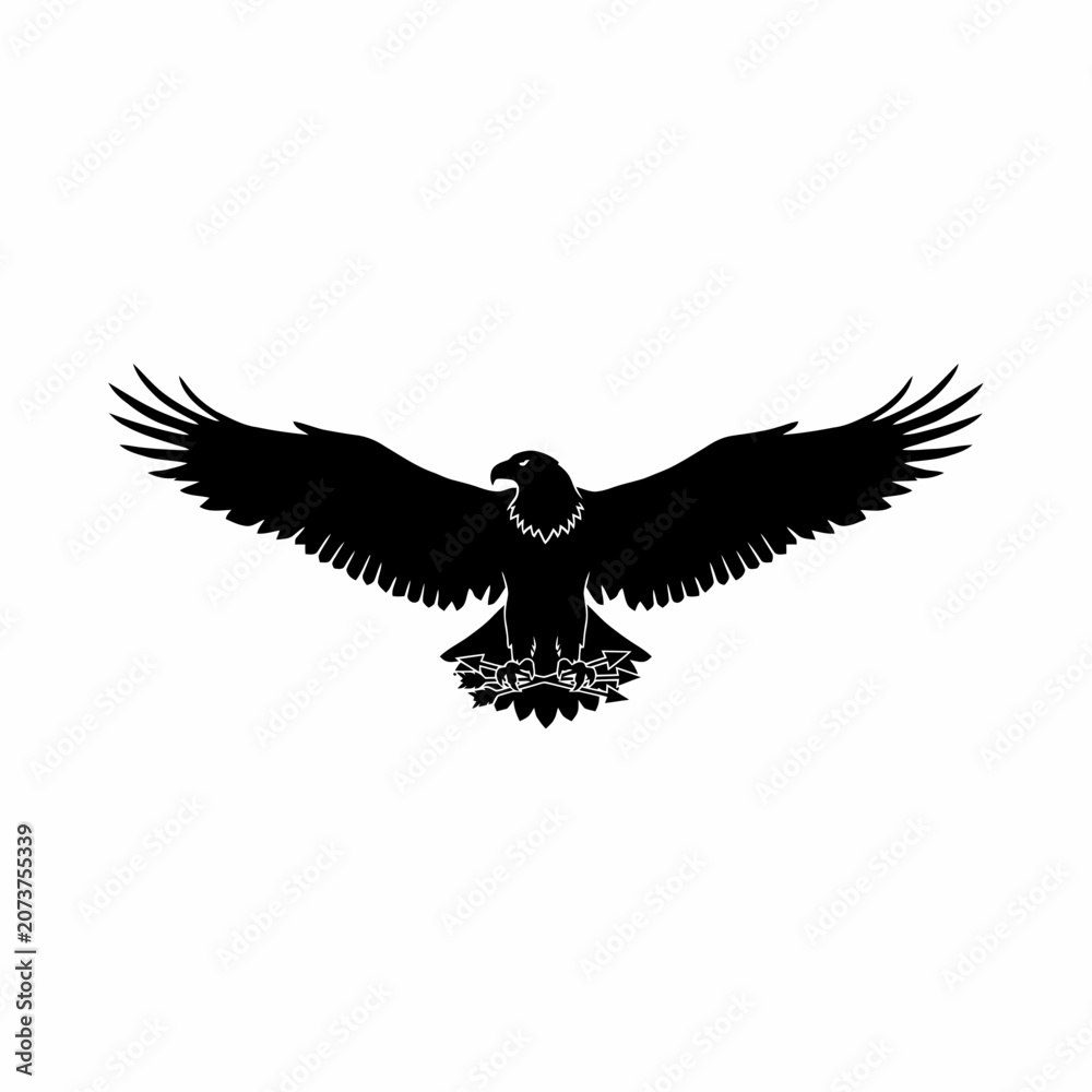 Fototapeta premium Eagle standing on branch with wings spread wide