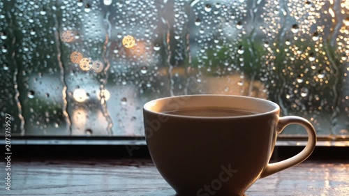Hot Coffee By Rainy Window Creating Peaceful Mood