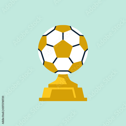 A golden soccer ball trophy is centered on a green background