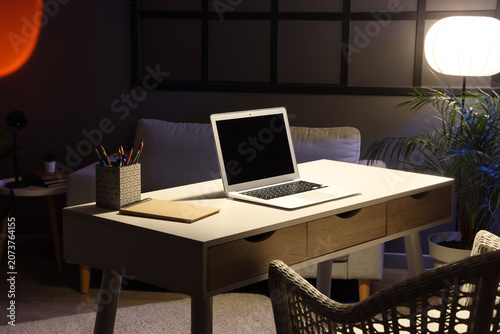 Workplace with blank laptop...