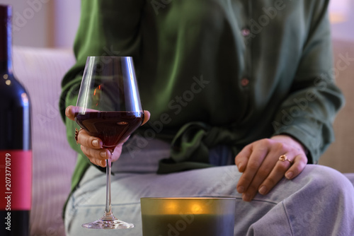 Woman with glass of red win...