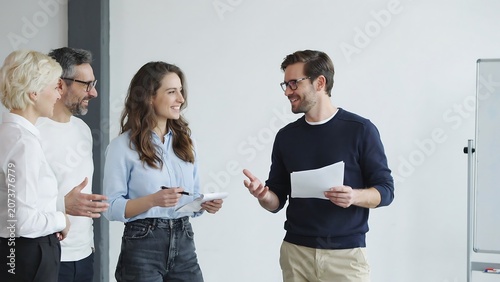 Diverse business team having a meeting in a bright office