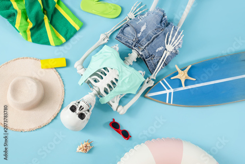 Human skeleton with beach a...