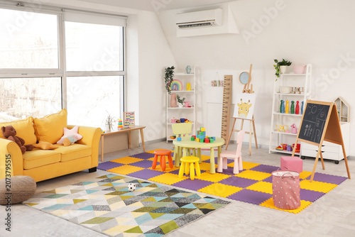 Interior of stylish playroo...