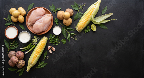 Overhead photo of Colombian Ajiaco chicken soup ingredients on La Chamba clay
