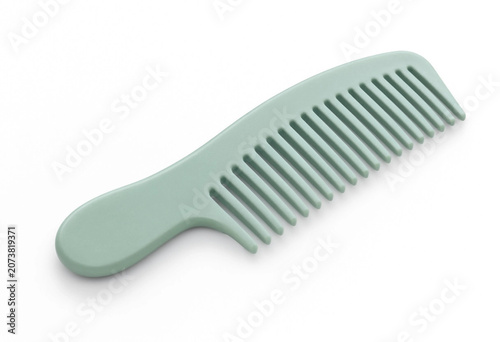 Light green plastic hair comb isolated on white background