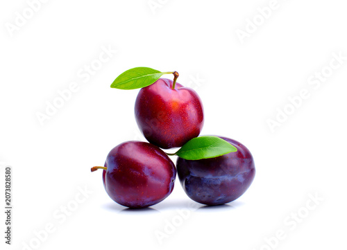 Plums isolated on white background.