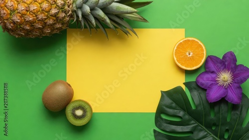 Tropical Flat Lay With Pineapple, Orange Slice, Kiwi, Gerbera Flower and Monstera Leaf Mockup