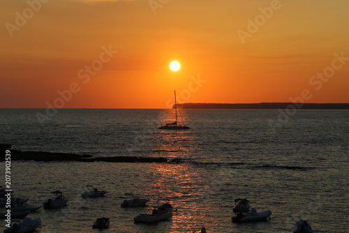 Beautiful sunset over Mediterranean Sea in Es Trenc Beach in Mallorca, Baleares, Spain	