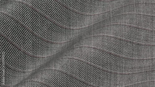 Elite Italian Medium Gray Pinstripe Wool Suiting Fabric flowing in classic corporate waves of executive stripe pattern and high end suit texture