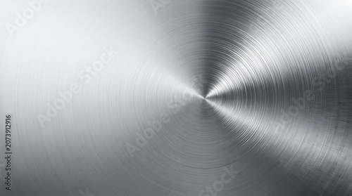 Brushed silver metal background with circular radial texture