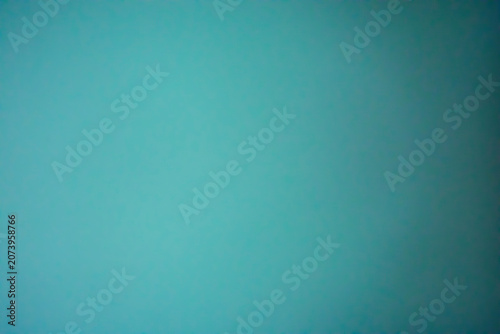 A soft, solid, cool-toned pastel background.