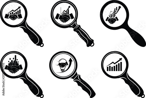 Magnifying glasses showing different business and finance icons