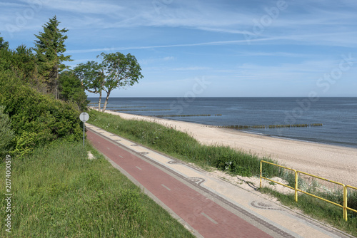 VELO BALTIC AND SEA COAST - A bike trail with a beach and the sea in the background