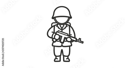 Soldier holding a rifle standing.