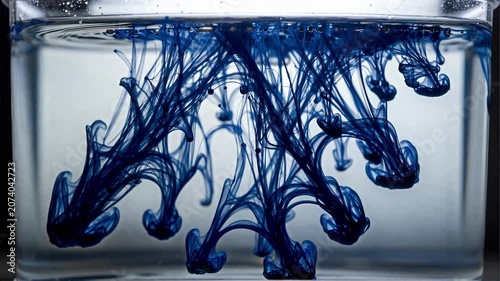 Ink Swirling in Water Creating Abstract Patterns