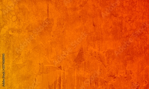 Dark Grunge Plaster Texture Orange Background with Dramatic Aged Surface.Rich dark grunge texture with an aged plaster-like surface,subtle cracks,organic variations,and deep atmospheric shading.