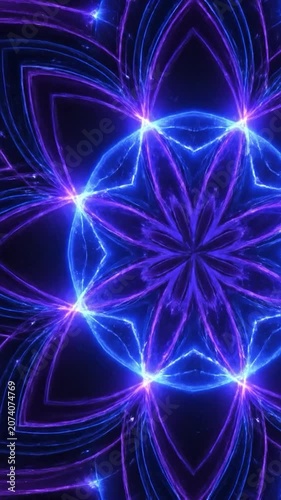 Electric blue geometric flower glows against velvet black background