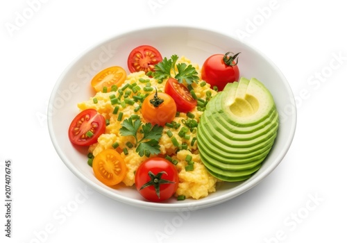 Fresh avocado tomato and corn salad with herbs in a bowl