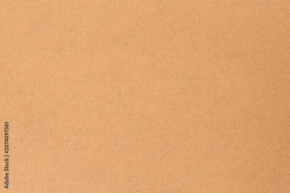 Fototapeta premium Brown kraft paper texture background with smooth recycled cardboard surface