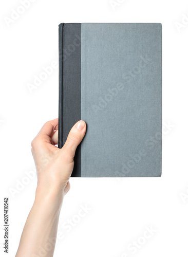 Hand holding a blank book with empty cover, isolated on transparent background. Clean mockup template for publishing, education, branding, presentation and design projects