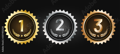 Tableau sur toile Set of three ranking medals with numbers 1, 2 and 3 in gold, silver and bronze on black background