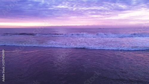 Aerial Drone View of Purple Sunset at Petitenget Beach, Bali, Indonesia