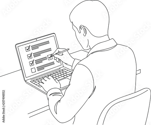 Man working on laptop computer while filling out digital survey form with pen stylus at office desk