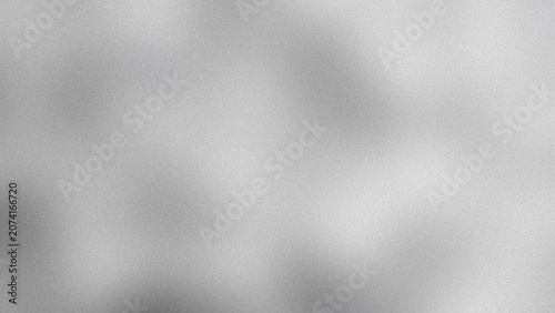Abstract soft grey background with smooth gradients and subtle light texture.