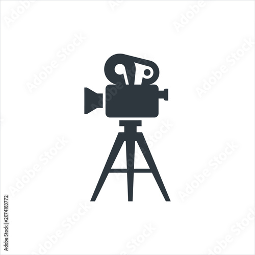 Konstfotografi Black film camera on tripod stand.