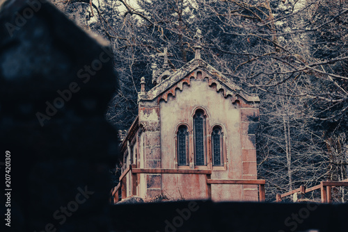 Historic chapel near Lac de la Maix surrounded by autumn forest