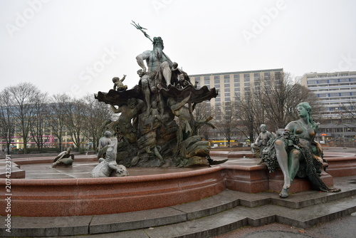 Photos General view of the landmark Neptune Fountain (Neptunbrunnen) featuring the Roman god Neptune with his trident surrounded by mythical figures and allegorical sculptures