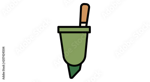 Green kitchen whisk utensil for mixing and blending