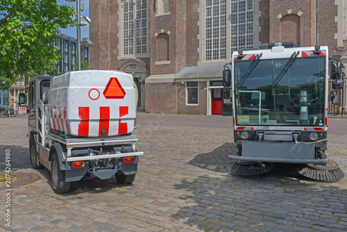 Street Sweeper Machine Cleaner Vehicle Parked in Front of Church Amsterdam Netherlands