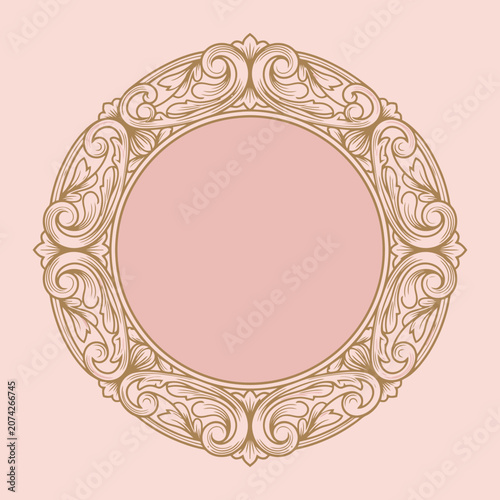 An elegant golden circular frame with intricate vintage floral patterns