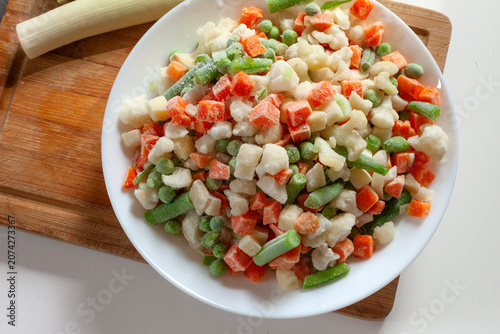 Frozen vegetables cut into cubes on a plate