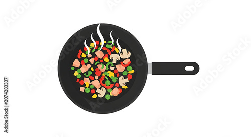 Top view of a frying pan with stirfry vegetables and meat