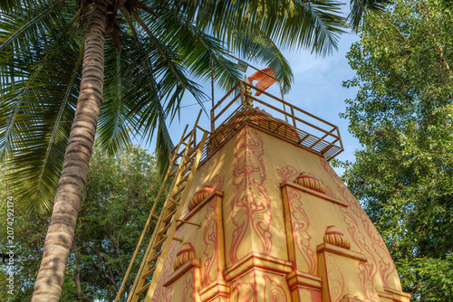 Vászonkép An exterior shot of a local Hindu temple in the suburban neighbourhood of Kharadi, showcasing traditional Indian temple architecture, intricate carvings and devotional details